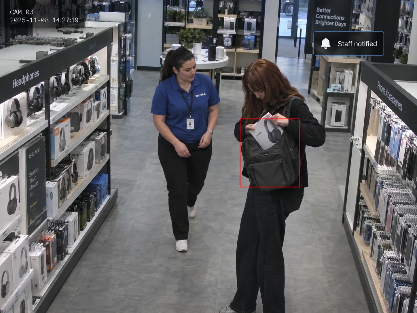 An employee responding as headphones are concealed in a backpack, with a staff alert